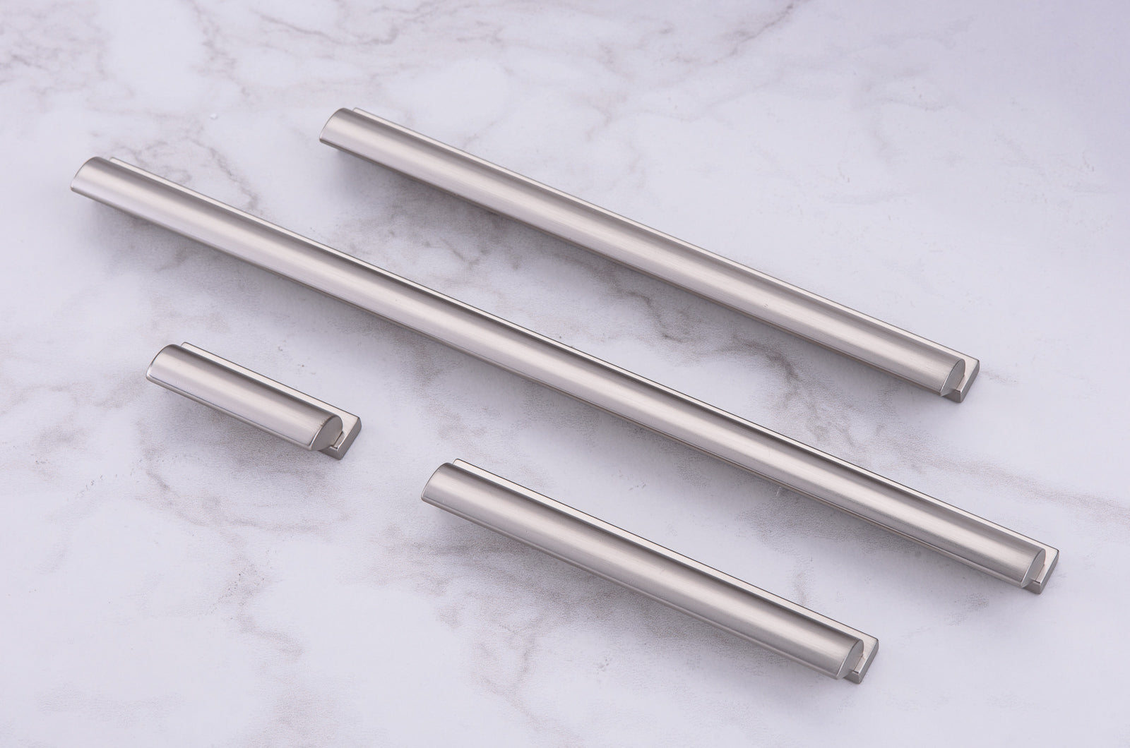 Lew's Finger Cabinet Knobs and Pulls in Brushed Nickel