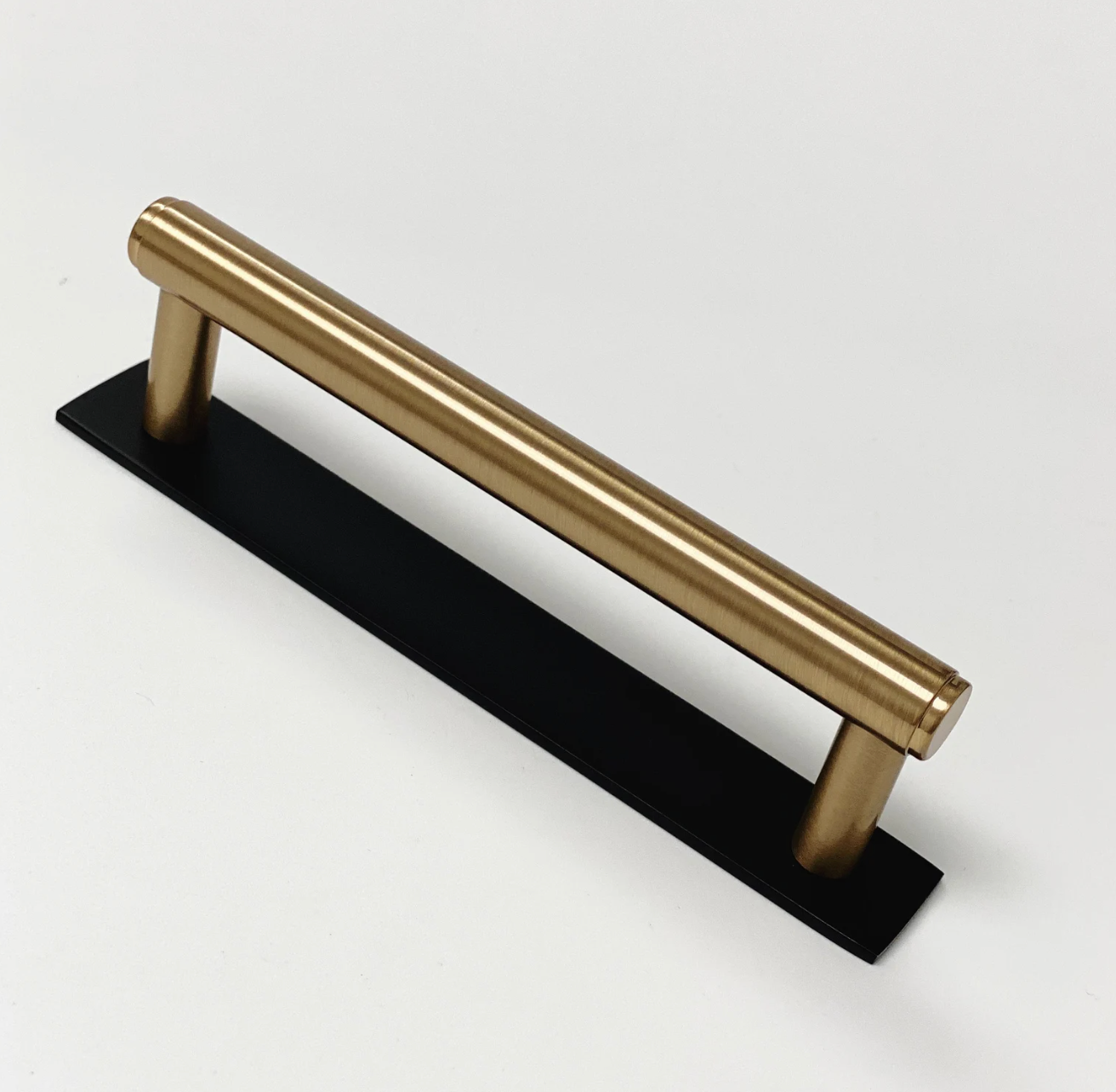 Dual Finish "Maison No. 2" Smooth Matte Black and Champagne Bronze Drawer Pulls and Cabinet Knobs with Backplate - Industry Hardware