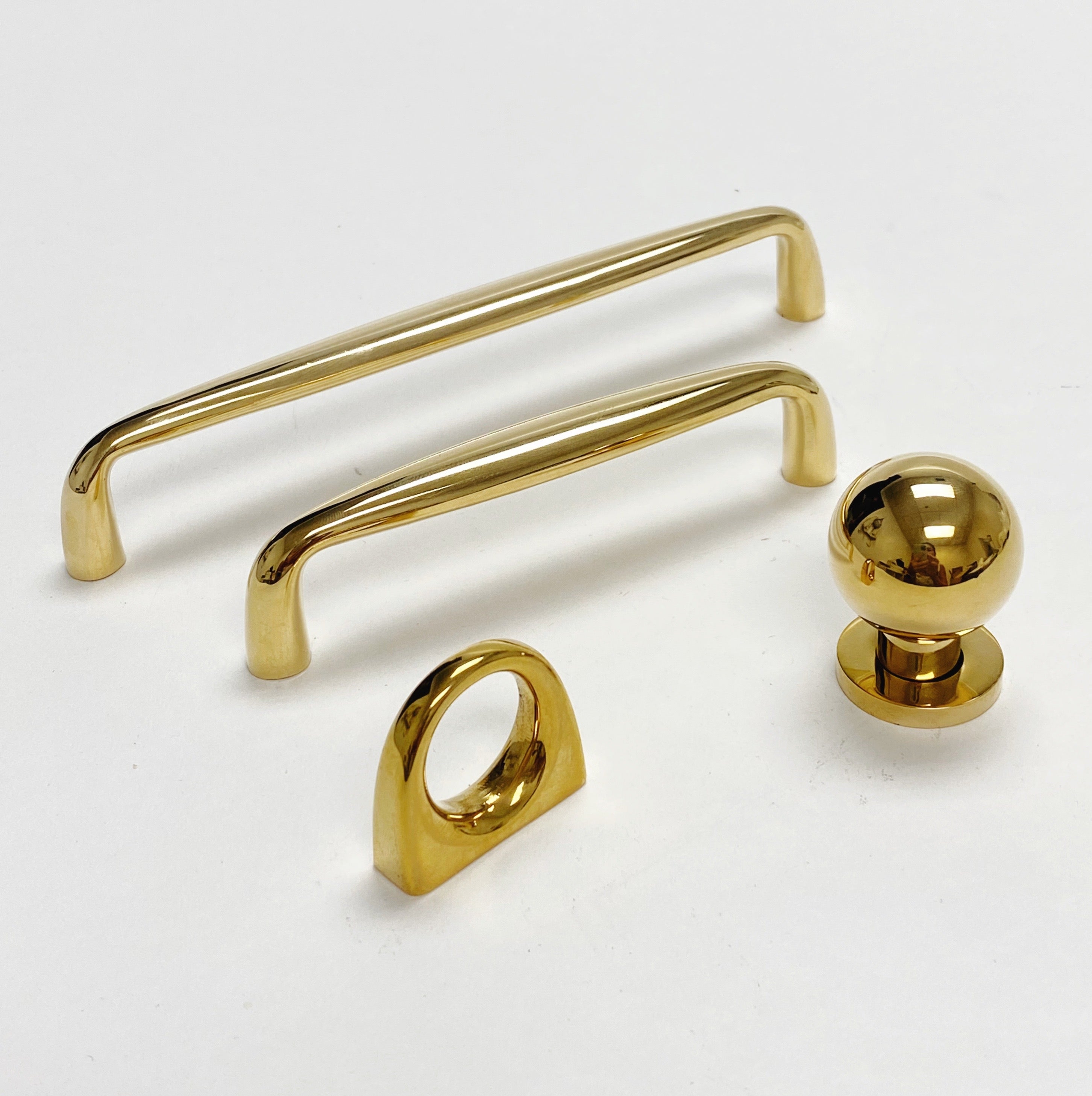 Omni Cabinet Knobs and Drawer Pulls in Unlacquered Brass - Industry Hardware