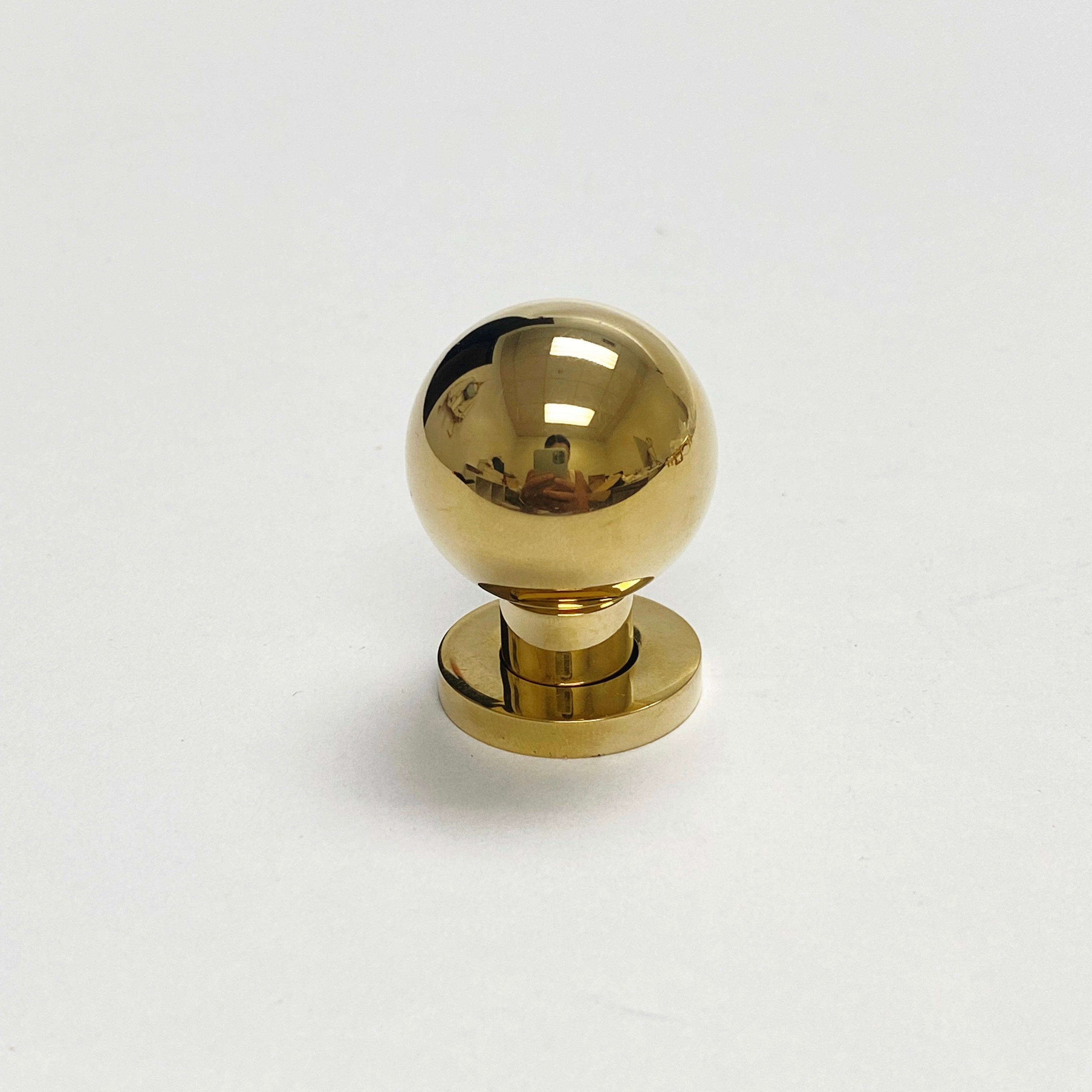 Omni Cabinet Knobs and Drawer Pulls in Unlacquered Brass