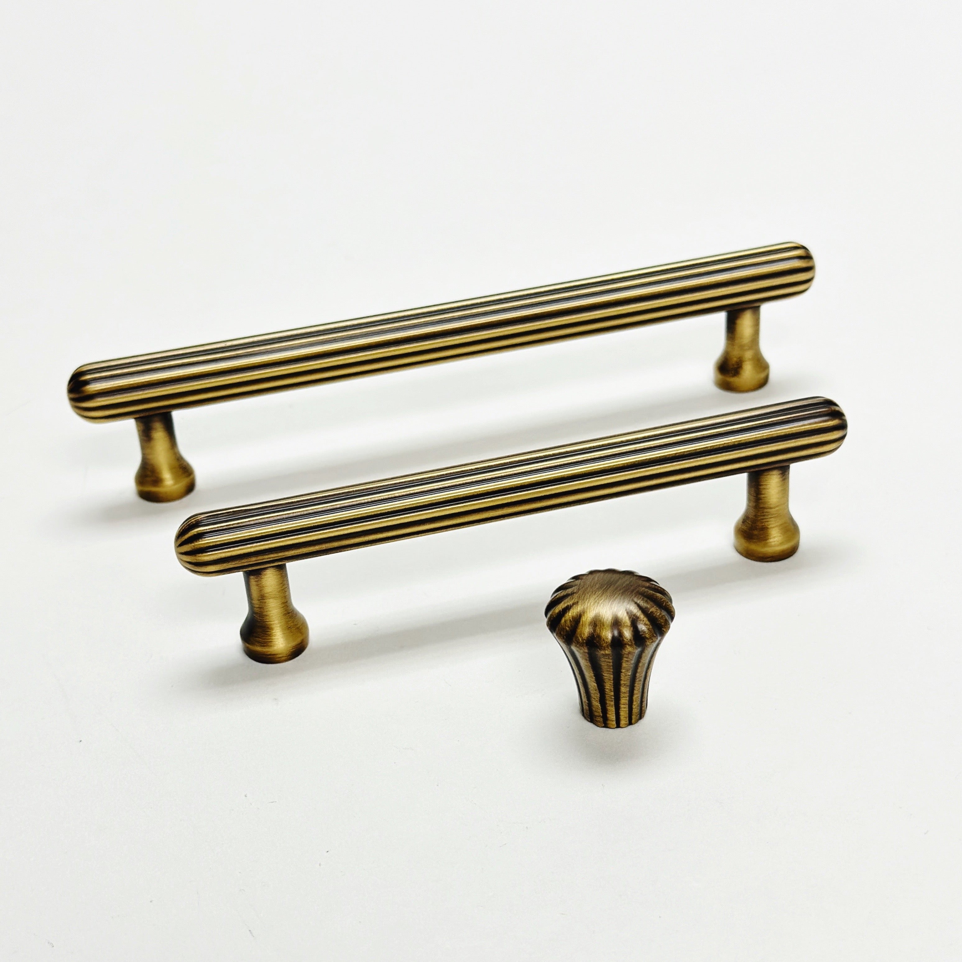 Fluted Antique Brass "Jewel" Ridge Cabinet Knobs and Pulls - Industry Hardware