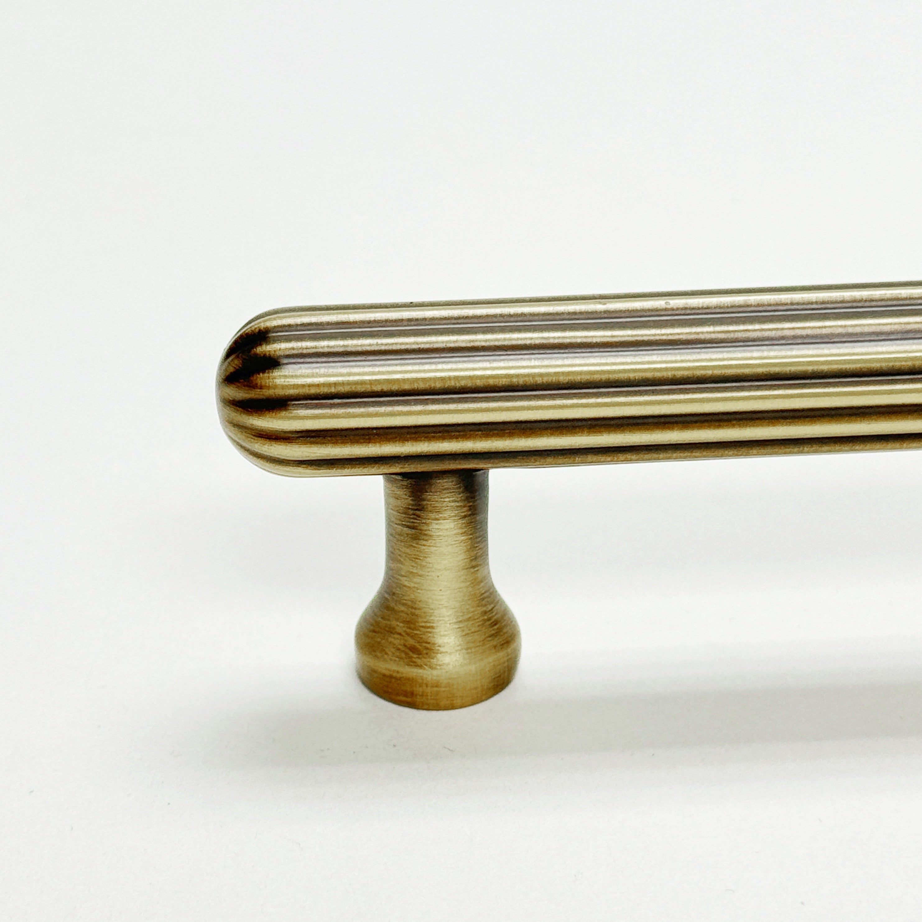Fluted Antique Brass "Jewel" Ridge Cabinet Knobs and Pulls - Industry Hardware