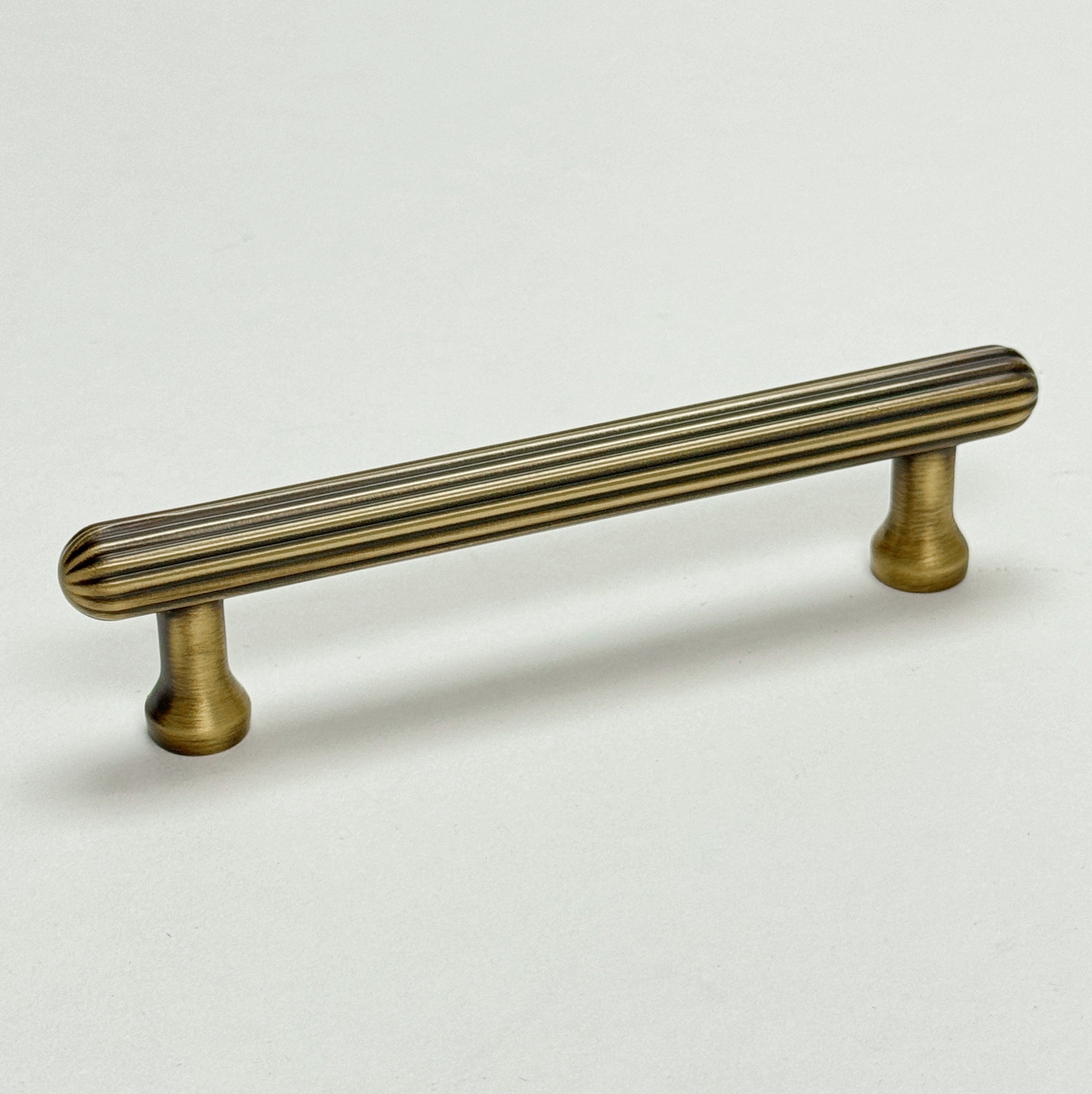 Fluted Antique Brass "Jewel" Ridge Cabinet Knobs and Pulls - Industry Hardware