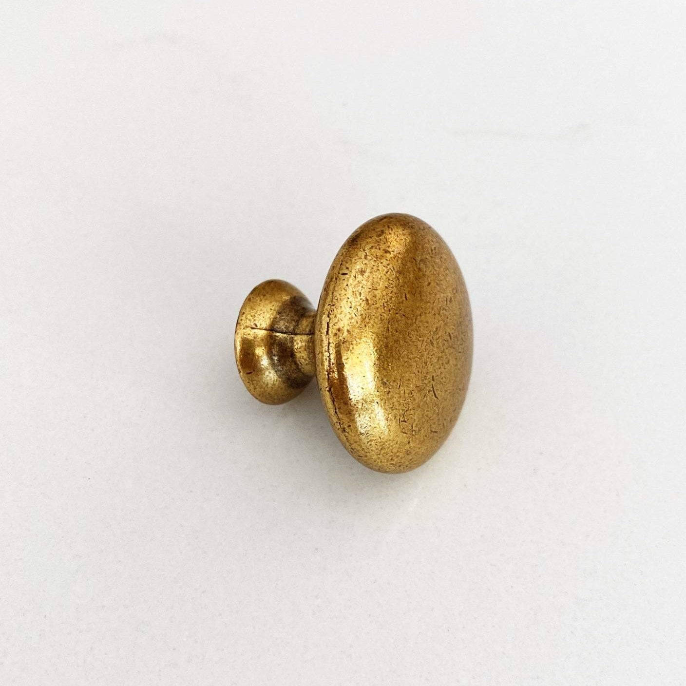 Antique Brass "Capri" Round Cabinet Knob | Pulls